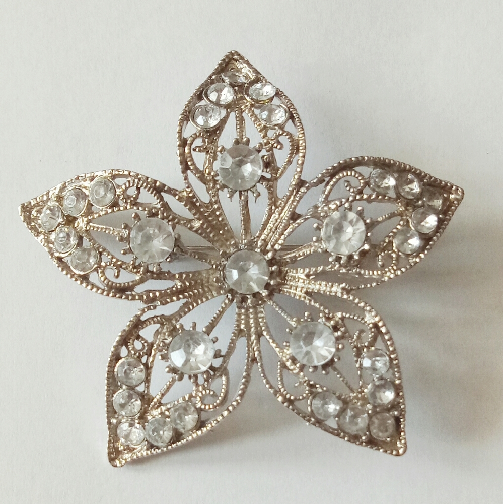 Silver rhinestone flower brooch